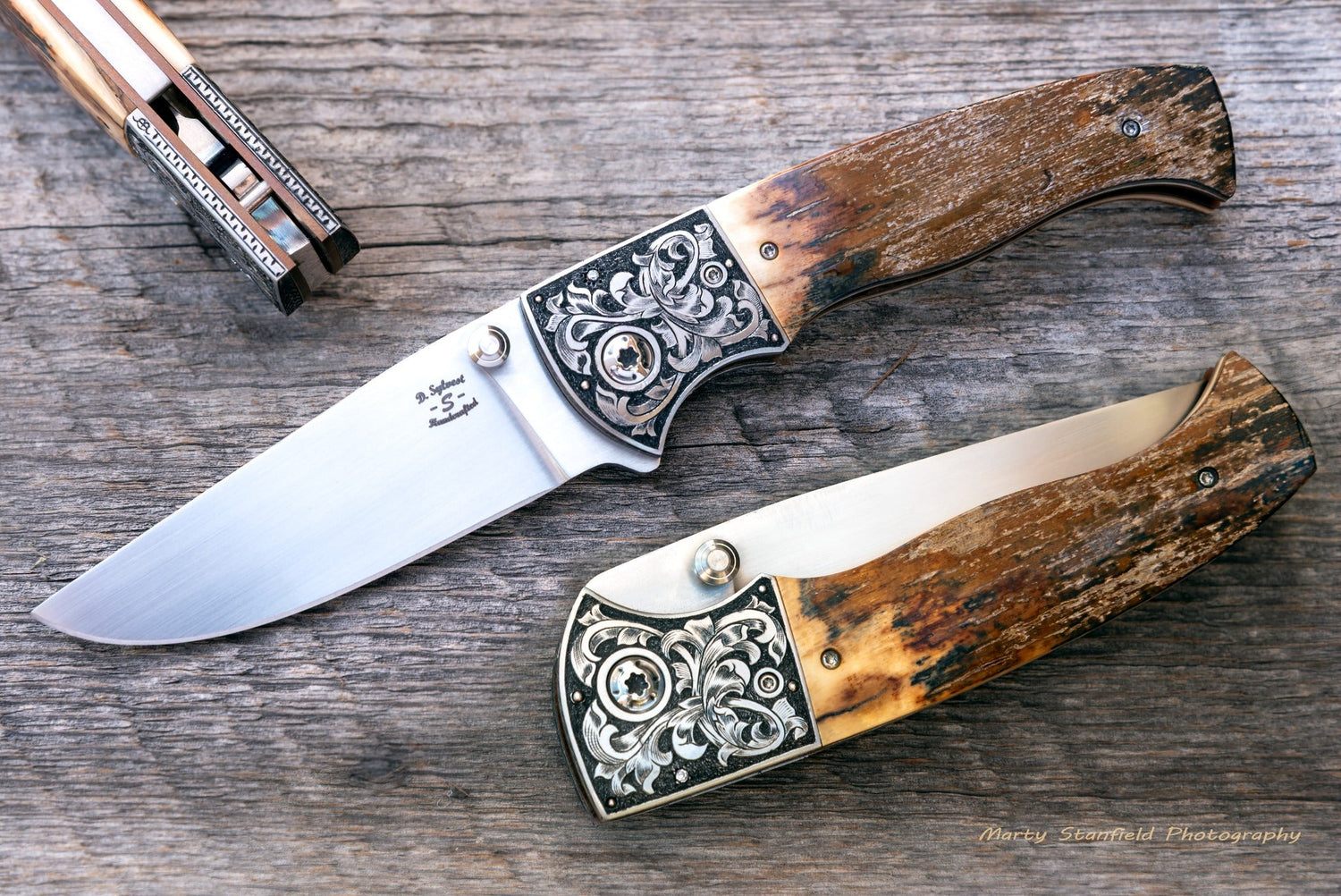 Engraved Trinity folding knives handcrafted by Don Sylvest